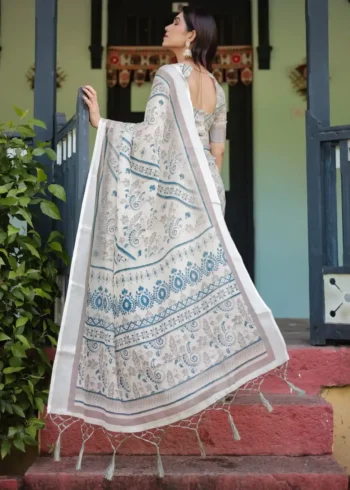 Cream and Beige Linen Saree With Elegant Blue Floral and Paisley Motifs