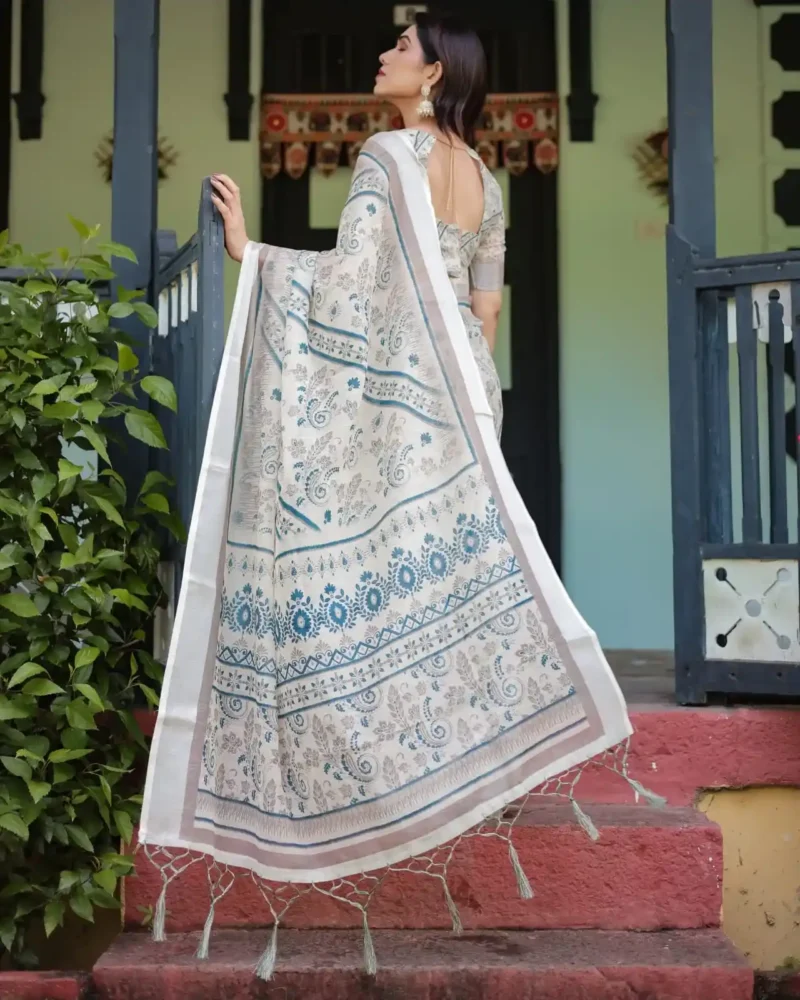 Cream and Beige Linen Saree With Elegant Blue Floral and Paisley Motifs