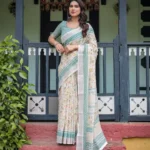 Soft Ivory Floral Printed Pure Linen Saree With Tassels