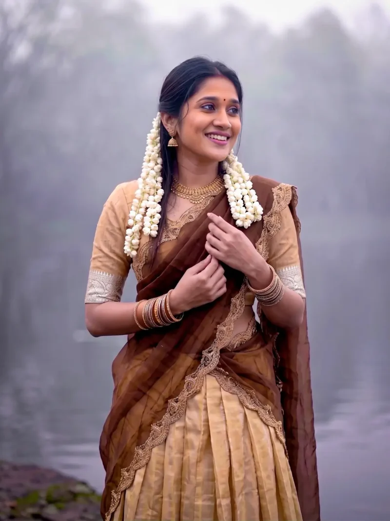 Village girl wearing Cream Colour Kanchipuram Half Saree Lehenga close look
