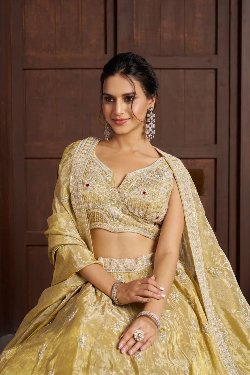 Radiant Haldi Mehendi Special Lehenga In Banarasi Tissue Fabric