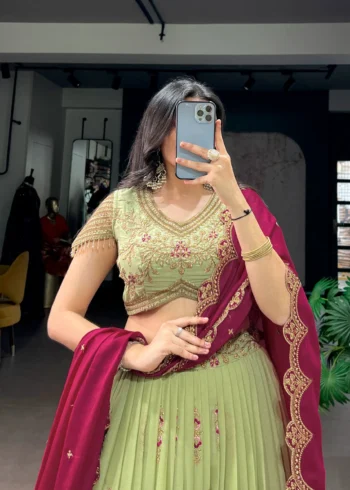 Aqua Georgette Party Wear embroidered Lehenga in pista colour close blouse view