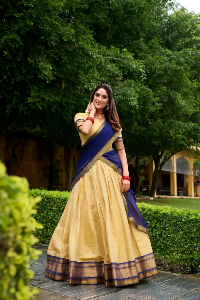Cream colour Kanchipuram Half Saree Lehenga