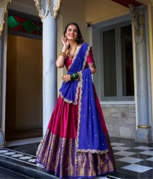Girl wearing pink designer wedding lehenga