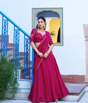 Girl wearing red designer lehenga