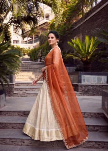 Off White Jacquard Half Saree Lehenga with Orange dupatta side look