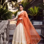 Off White Jacquard Half Saree Lehenga with Orange dupatta