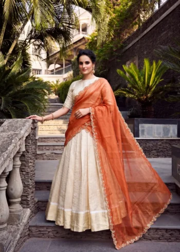 Off White Jacquard Half Saree Lehenga with Orange dupatta
