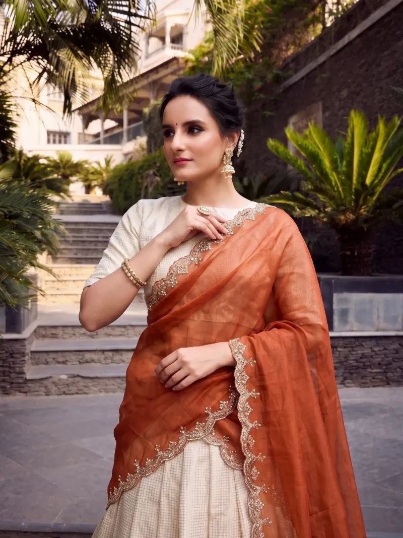 Off White Jacquard Half Saree Lehenga with Orange dupatta close