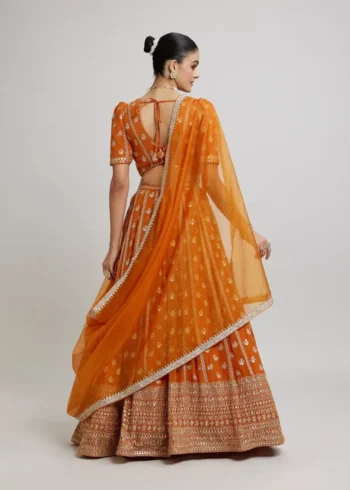 Orange Colour Georgette Haldi Lehenga back side look