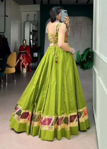 Parrot Green Cotton Navratri Lehenga with Cowrie Lace Blouse back side look