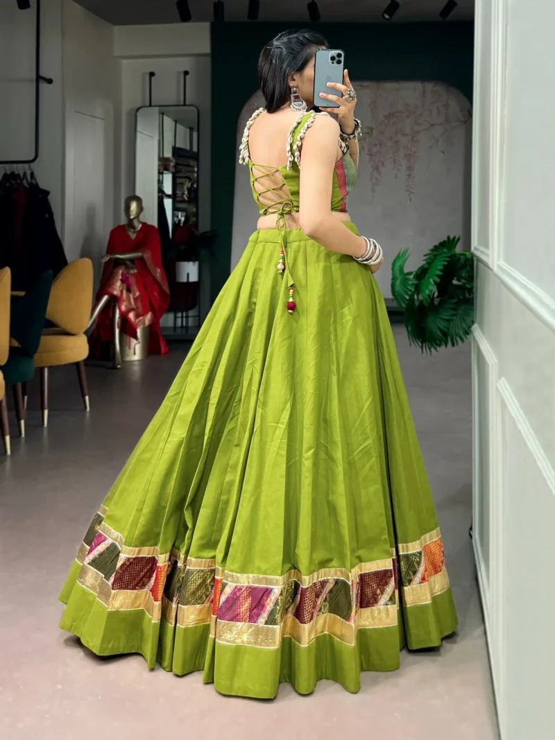 Parrot Green Cotton Navratri Lehenga with Cowrie Lace Blouse back side look