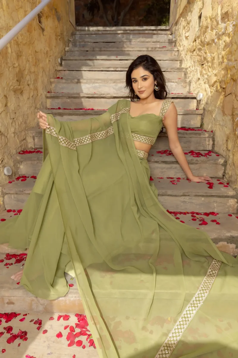 Pastel Green Faux Georgette Bridesmaid Lehenga model lying on stair