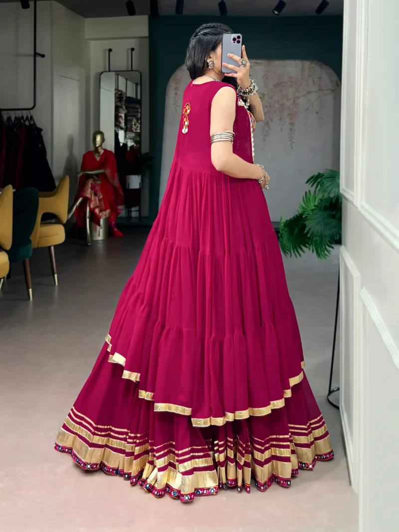 Rani Pink Navratri Lehenga with Gamthi Work Blouse and Mirror Long Koti back side design