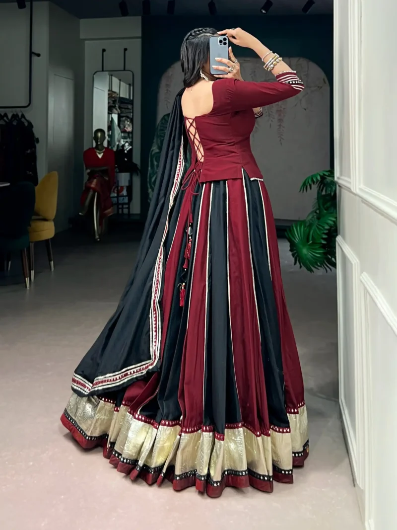 Woman wearing Ready to Wear Chinon Navratri Lehenga with Mirror Lace backside look