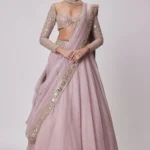 Ash Pink Organza Silk Sequin Embroidered Wedding Lehenga Choli front design