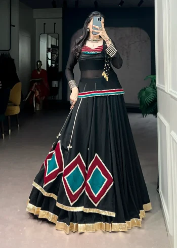 Black Marble Navratri Lehenga with Cowrie Bell Detailing and Sheer Tunic front look