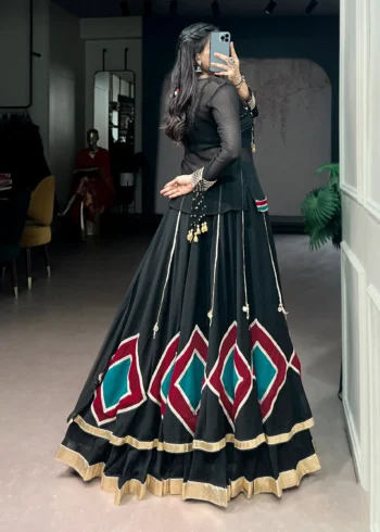 Black Marble Navratri Lehenga with Cowrie Bell Detailing and Sheer Tunic side look