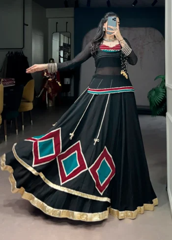 Black Marble Navratri Lehenga with Cowrie Bell Detailing and Sheer Tunic full flair