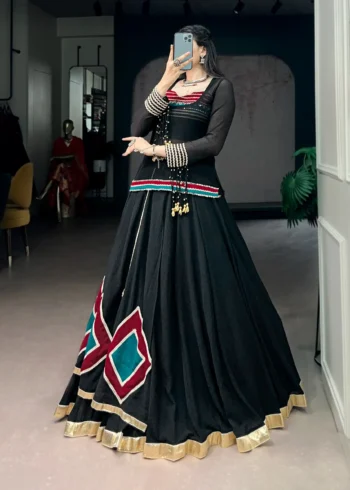 Black Marble Navratri Lehenga with Cowrie Bell Detailing and Sheer Tunic side look