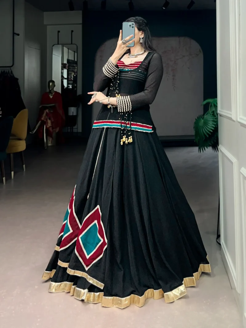 Black Marble Navratri Lehenga with Cowrie Bell Detailing and Sheer Tunic side look