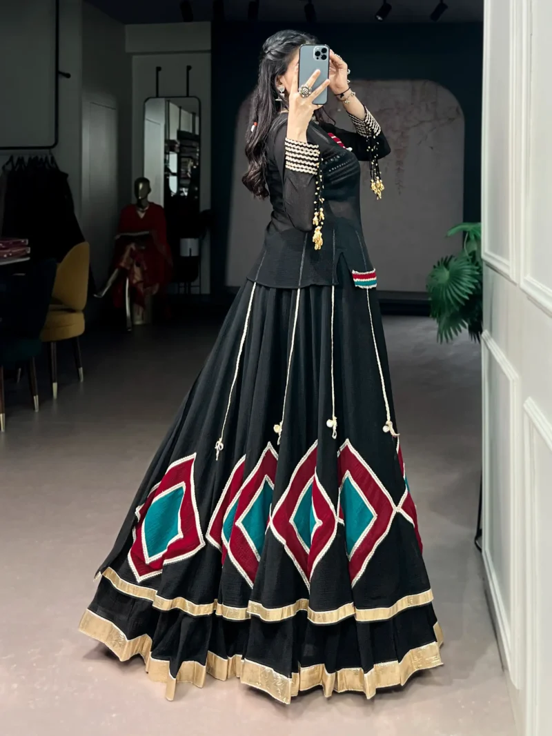 Black Marble Navratri Lehenga with Cowrie Bell Detailing and Sheer Tunic back side look