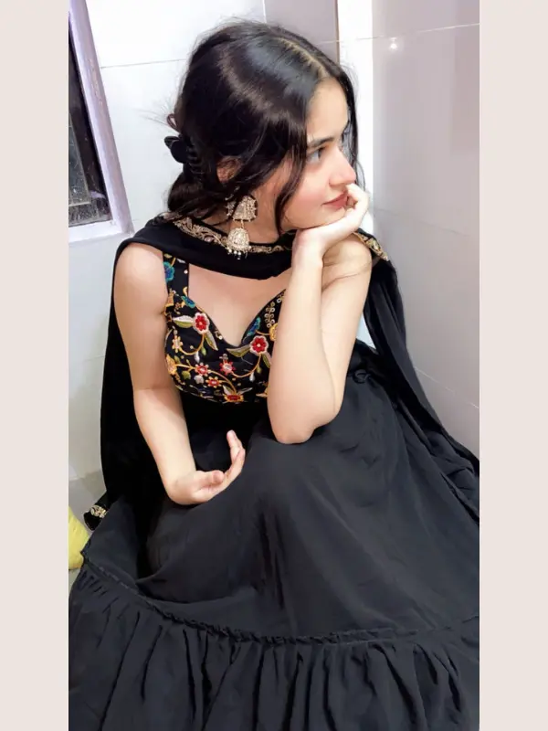 Client wearing Bella Signora black partywear lehenga