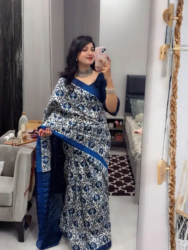Client wearing Bella Signora blue printed saree