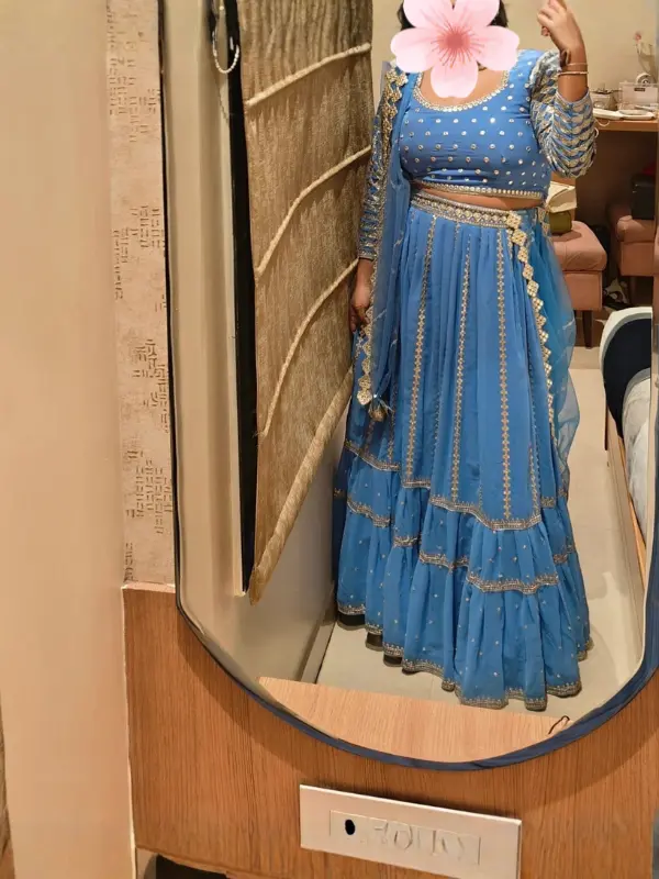 Client wearing Bella Signora rama wedding lehenga