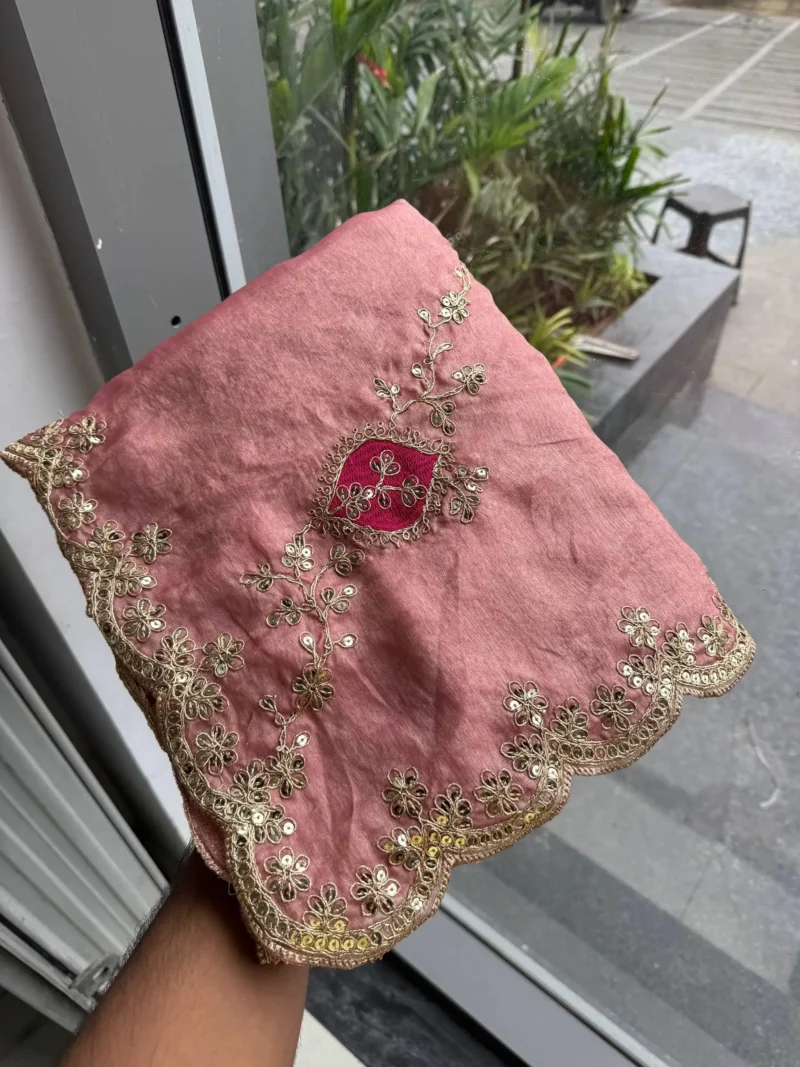 Peach Designer Fendy Satin Silk Wedding Saree in hand