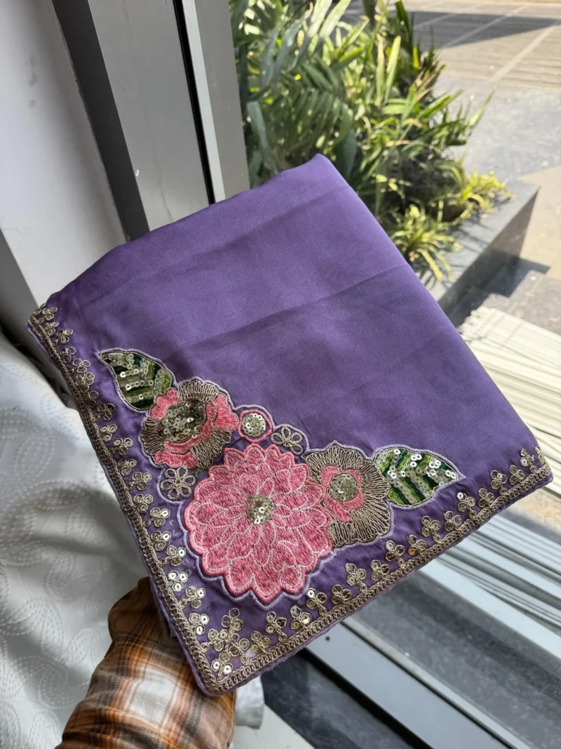 Dusty Lavender Rangoli Silk Party Wear Saree in hand