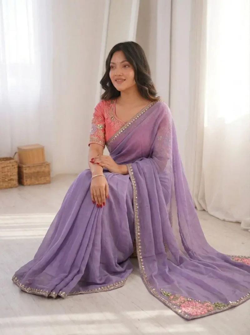 Dusty Lavender Rangoli Silk Party Wear Saree sitting pose