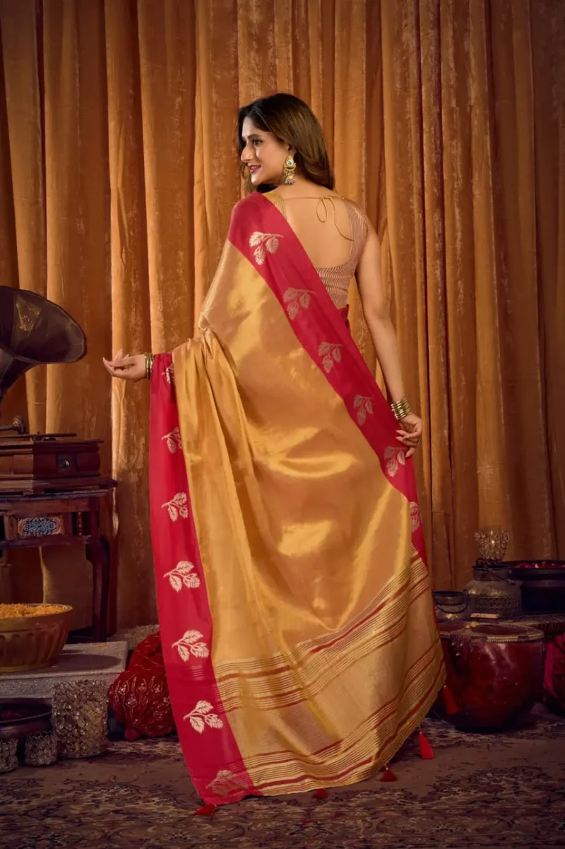 Orange Soft Tissue Saree with Contrast Border & Jhallar back side look