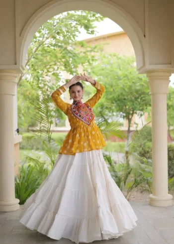 Yellow Kora Cotton Bandhni Print Navratri Lehenga with Kutchi Gamthi Top front look