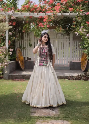 White Kora Cotton Designer Navratri Lehenga with Kutchi Patchwork Blouse front look