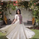White Kora Cotton Designer Navratri Lehenga with Kutchi Patchwork Blouse flair look