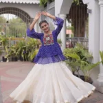 Blue Kora Cotton Laheriya Print Navratri Lehenga with Kutchi Gamthi Work flair look