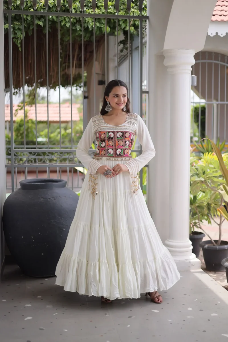White Colour Kutchi Gamthi Mirror Work Navratri Gown with 12 Meter Flair front look