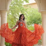 Orange Laheriya Print Kutchi Patchwork Navratri Garba Gown flair look
