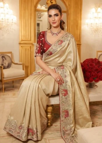 Beige Kanjivaram Silk Heavy Embroidered Wedding Saree sitting pose