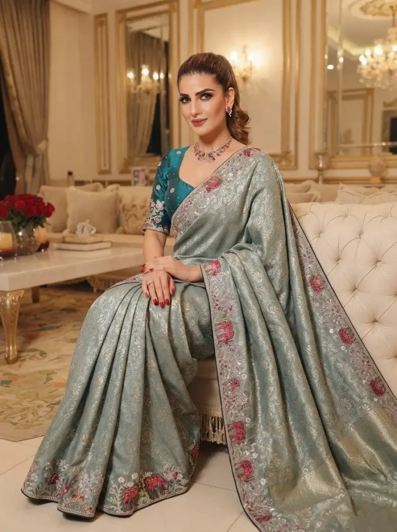 Grey Kanjivaram Silk Heavy Embroidered Wedding Saree sitting pose