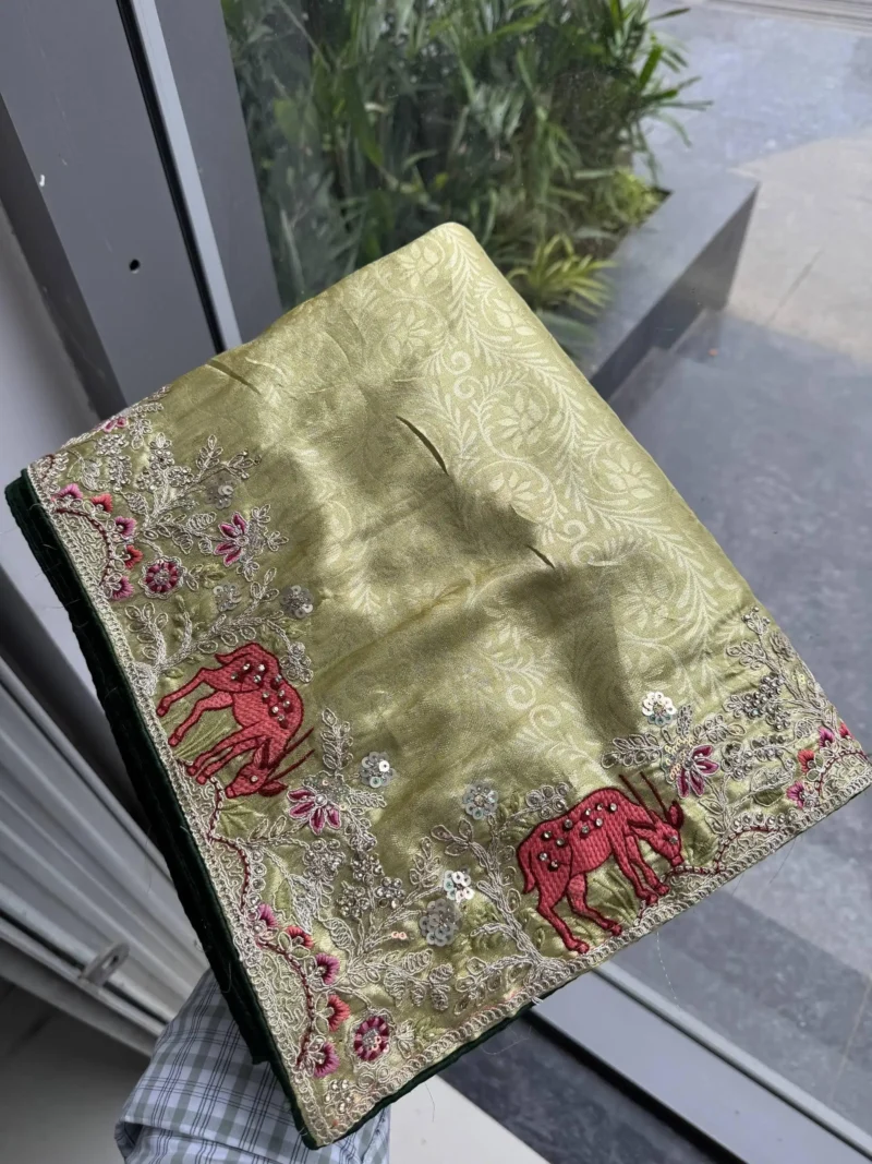 Pista Kanjivaram Silk Heavy Embroidered Wedding Saree in hand