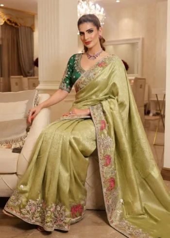 Pista Kanjivaram Silk Heavy Embroidered Wedding Saree sitting pose