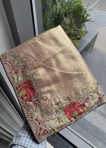 Pastel Kanjivaram Silk Heavy Embroidered Wedding Saree in hand