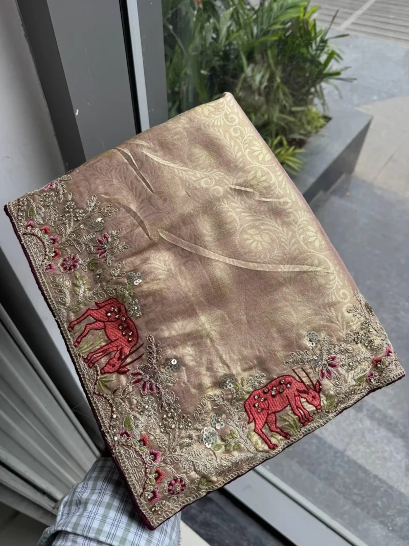 Pastel Kanjivaram Silk Heavy Embroidered Wedding Saree in hand