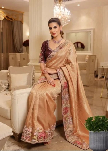 Pastel Kanjivaram Silk Heavy Embroidered Wedding Saree sitting pose