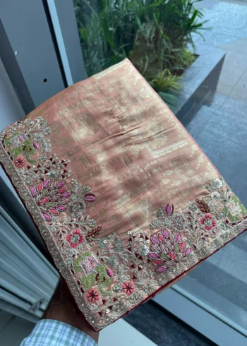 Peach Royal Hathi Pure Kanjivaram Silk Heavy Embroidered Bridal Saree in hand