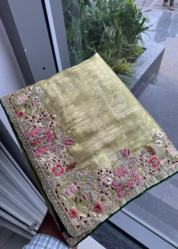 Pista Royal Hathi Pure Kanjivaram Silk Heavy Embroidered Bridal Saree in hand