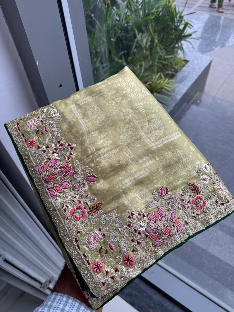 Pista Royal Hathi Pure Kanjivaram Silk Heavy Embroidered Bridal Saree in hand