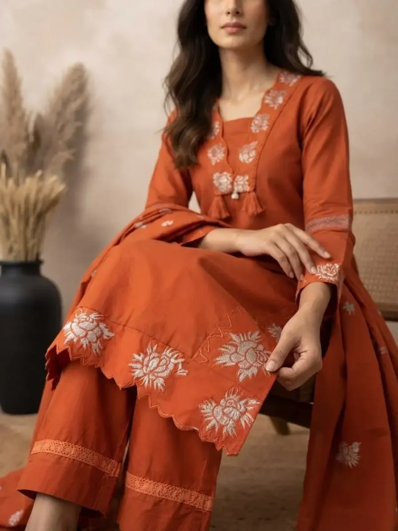 Rust Orange 60-60 Cotton Embroidered Kurta Pant Set with Dupatta sitting pose
